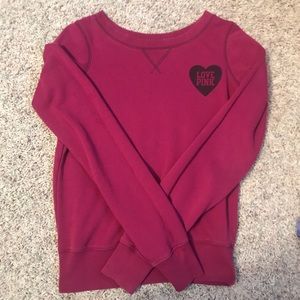 pink crew neck sweatshirt
